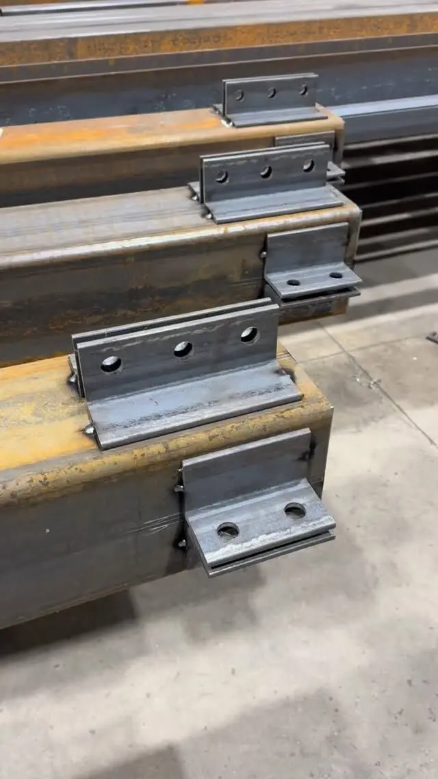 Beams with welded connection plates